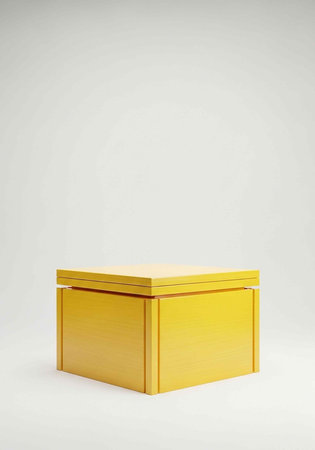 A bright yellow gift box with a lid on a plain white background