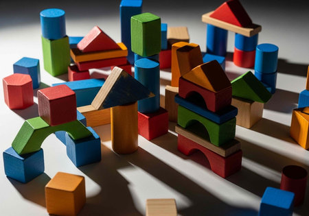 A colorful assortment of wooden blocks arranged in a creative and playful manner on a table