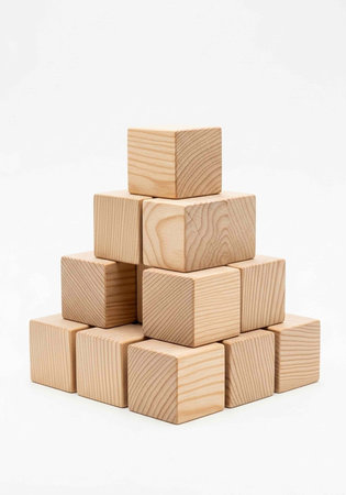 A pyramid structure made of light-colored wooden blocks on a plain white background