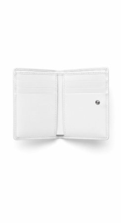 White leather wallet open showing interior card slots and silver button on right side
