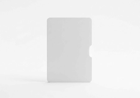A single white object with a cutout stands alone on a white surface and background