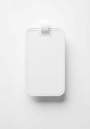 A blank white label with a strap on a plain background, ready for customizationの写真素材