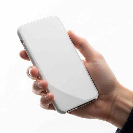 A hand holding a white smartphone with a blank screen on a plain background