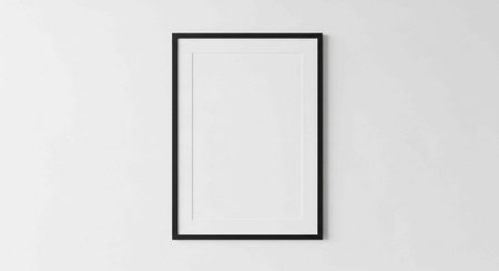 A blank white poster in a sleek black frame on a light gray background