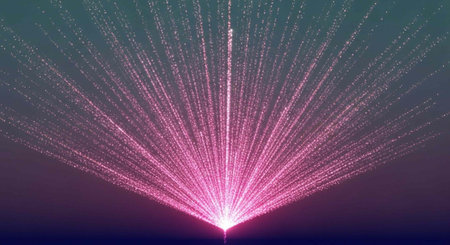 A vibrant pink light explodes in a dark background with sparkling particles radiating outward in all directions.の写真素材