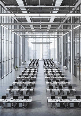 A large, modern office space with rows of desks and computers in a sleek, minimalist environment.の写真素材
