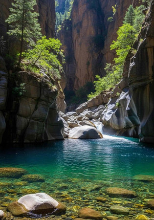 A serene and vibrant canyon with a clear river flowing through it surrounded by lush greenery and...