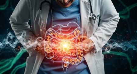 Medical professional with stethoscope and glowing red colon illustration on abdomenの写真素材