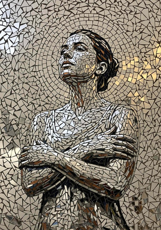 A mosaic artwork of a woman with her arms crossed and a serene expression on her faceの写真素材