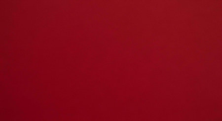 A vibrant red background with a smooth gradient effect