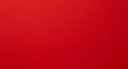A vibrant red background with a bold and dramatic color scheme