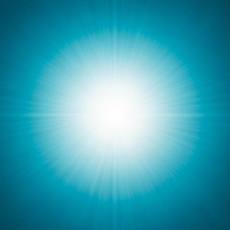 A bright white light shining against a vibrant blue background with a lens flare effectの写真素材