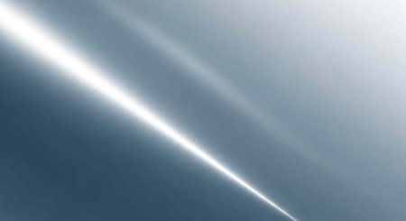 A bright beam of light shines through a cloudy sky with a beautiful display of natural illumination