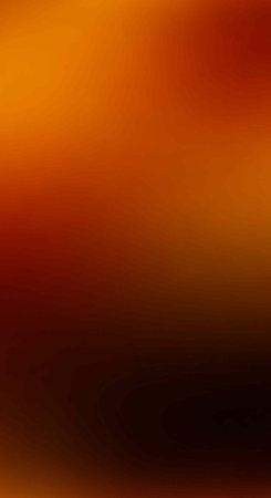 A vibrant and dramatic gradient background with warm orange and yellow hues