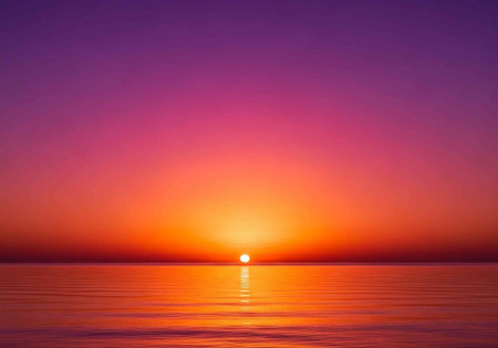 A serene sunset over a calm ocean with vibrant colors in the sky