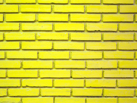 Yellow brick wall texture backgroundの写真素材
