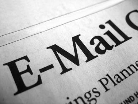 The word "e-mail" isolated from a newspaper headline.の写真素材
