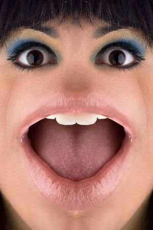 A closeup of a distorted womans face that makes her look like a frog.  This lady is missing her nose.の写真素材
