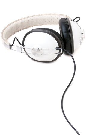 A set of retro style head phones isolated over a white background.の写真素材