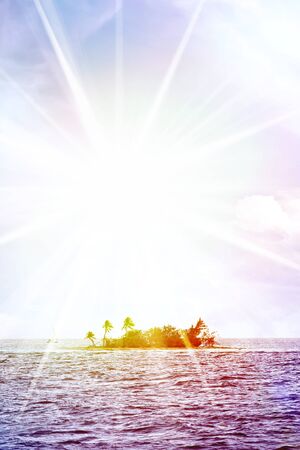 A small desert island off the coast of Puerto Rico called Palominito with bright lens flare.