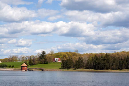 A view of the water at the public drinking water reservoir on the New Britain Southington town line in Connecticut. Fishing here is prohibited.の写真素材