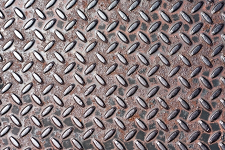 Closeup of real diamond plate metal material. の写真素材