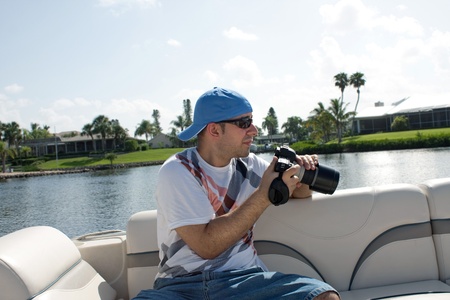 Commercial stock photographer during a photo shoot outdoors.の写真素材