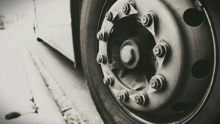 Bottom half of a public city bus. の素材