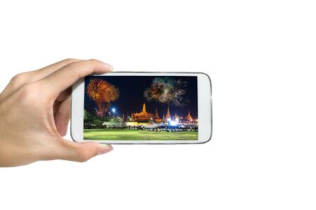 Holding a smart phone ,Take a pictureの写真素材