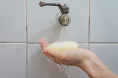 Hygiene. Cleaning Hands. Washing hands under flowing tap water.の写真素材