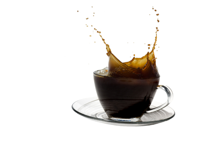 Coffee splash and cup of coffee isolated on white backgroundの写真素材