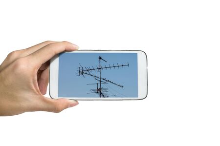 Holding a smart phone ,Take a pictureの写真素材