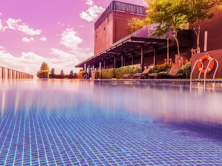 Resort terrace with rooftop pool at rosy sunsetのeditorial素材