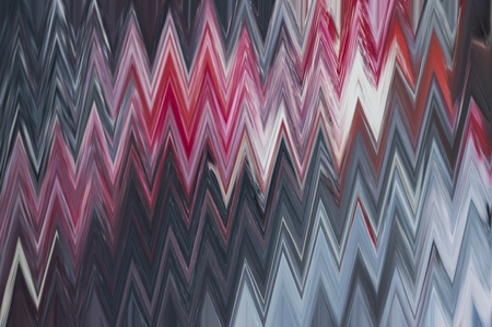 Background of blurred colorful abstraction of gray and red colors in chevron patternの写真素材
