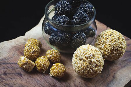 Tilgul OR Sweet Sesame Laddu for Indian festival Makar Sankranti, Sesame seed ball and tilgul. Special treat prepeared on the ocassion of Makar Sankranti in India. Selective focusの写真素材