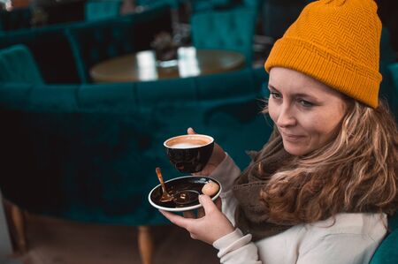 Girl smiling drinking coffeeのeditorial素材