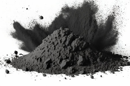 charcoal powder. Isolated, strewn black coal powder on a white background. wood fired charcoalの素材