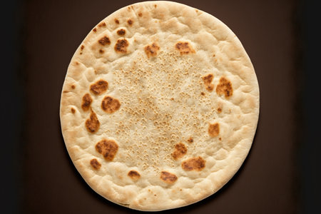 White tandoor made pita bread, isolated on a background. classic Armenian lavash with a thin, fried crust, top viewの素材