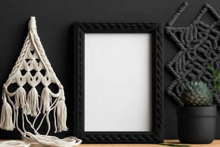 mockup of a black photo frame with macrameの素材
