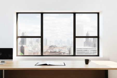 Mockup of an empty office with a wooden table and a wide window in the backgroundの素材