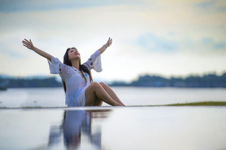 young happy and attractive Asian Chinese woman enjoying Summer holidays relaxing carefree at...