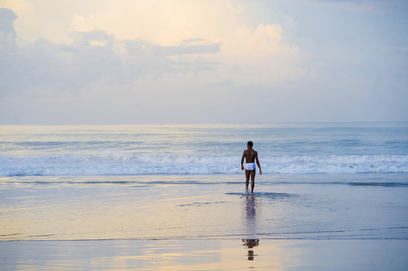 beautiful panoramic view of amazing tropical paradise desert beach on sunrise with black afro ...