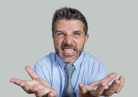 angry and furious businessman in shirt and necktie scolding and nagging fierce on company...
