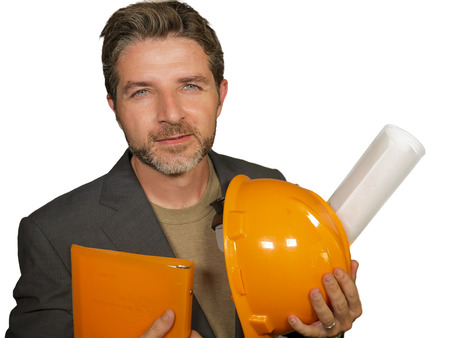corporate portrait of young attractive and successful industrial engineer or architect in safety...
