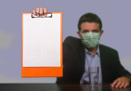 health organization executive man in medical face mask giving information at press conference about...