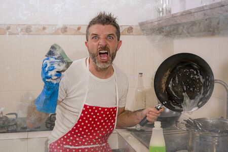 domestic chores stress - lifestyle portrait of young attractive overworked and stressed home cook...