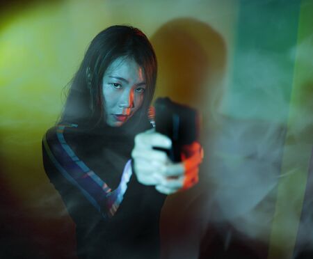 cinematic portrait of young attractive and dangerous special agent woman spy or Asian Korean mobster...