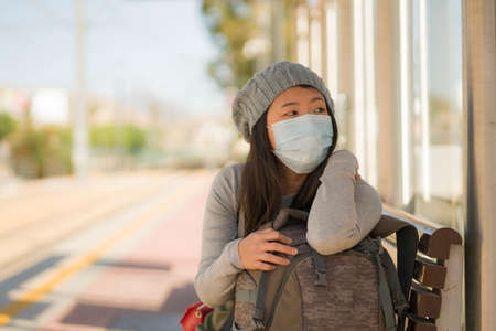 young beautiful and happy tourist Asian woman traveling during new normal - attractive Korean girl...