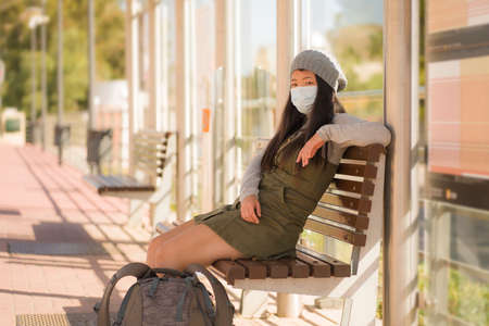 young beautiful and happy tourist Asian woman traveling during new normal - attractive Korean girl...