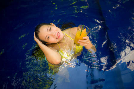 beautiful Asian woman enjoying luxury holidays trip - young attractive and happy Korean girl in...